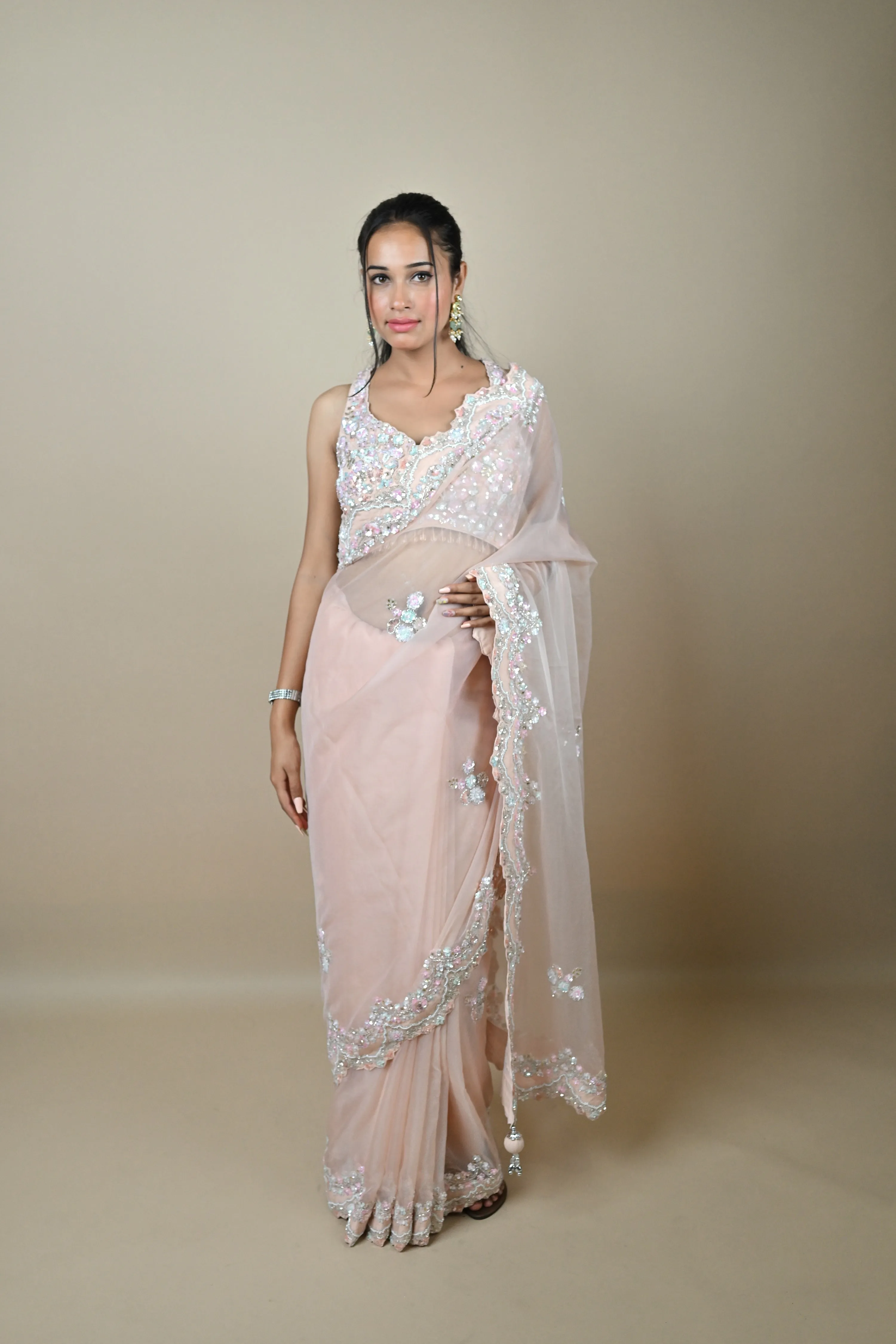 Hand embroidered Nude Pink Pure Organza saree